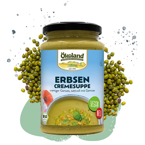 KI generiert: Ein Glas Erbsencremesuppe von Ökoland, umgeben von Erbsen. Text: "ERBSEN CREMESUPPE, Vegan, NEU".