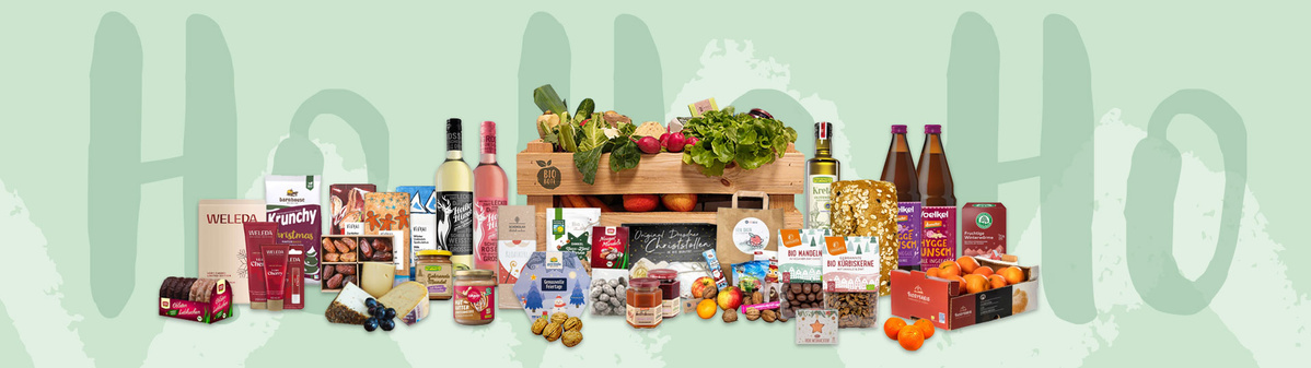 Vielfältige Lebensmittelprodukte vor grünem Hintergrund. Text: "Ho Ho Ho".