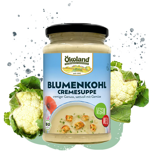KI generiert: Ein Glas Ökoland Blumenkohlcremesuppe, vegan und bio.