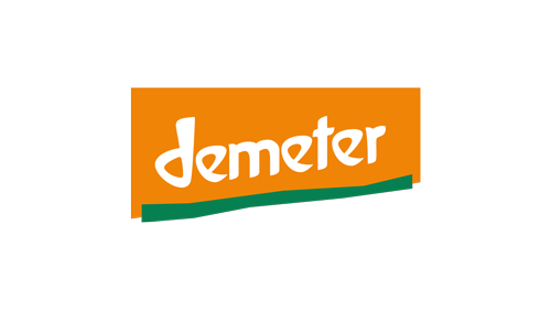 KI generiert: Das Bild zeigt das Demeter-Logo auf orangem Hintergrund.